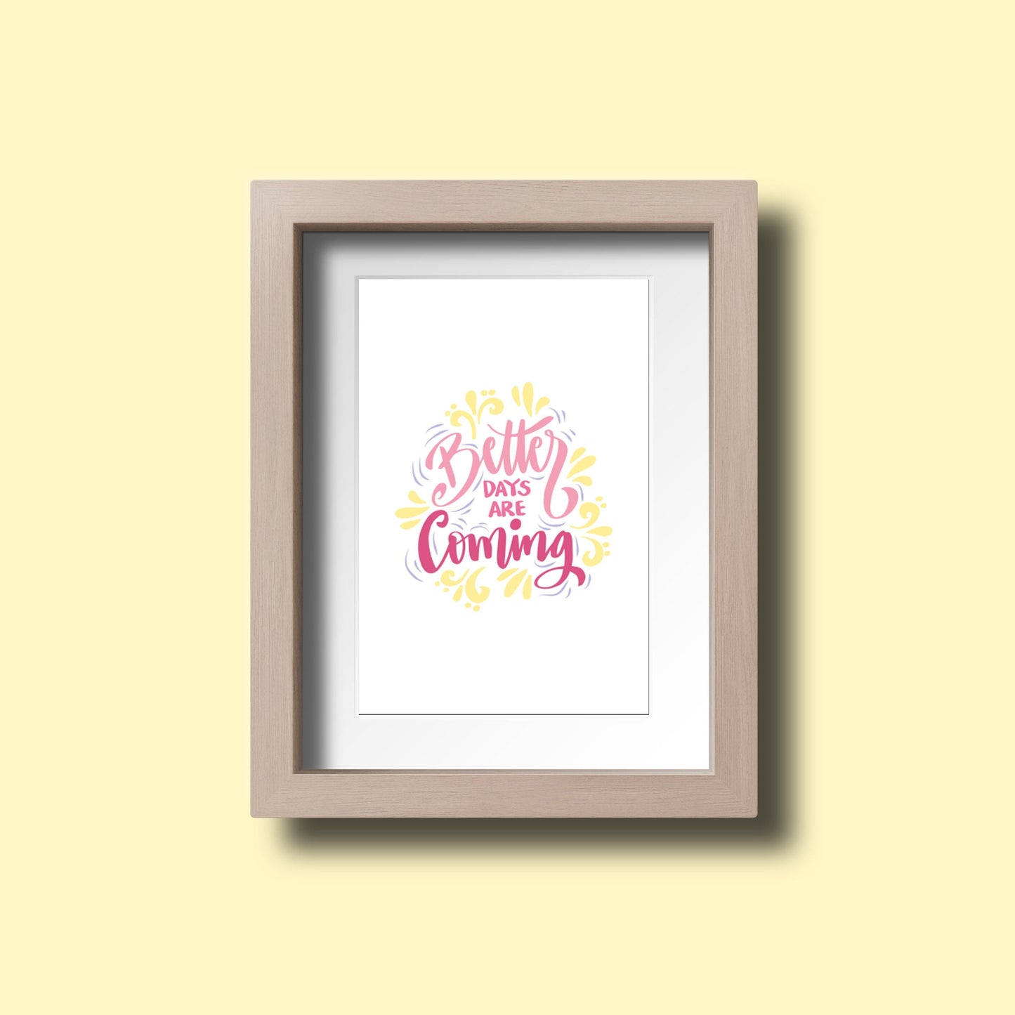 Framed artwork with 'Better Days Are Coming' text on a yellow wall