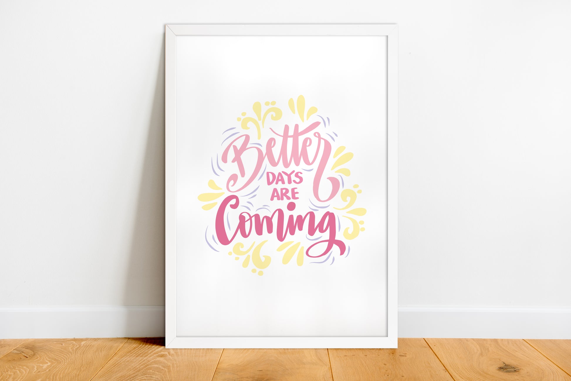 Framed print with 'Better Days Are Coming' text on a white wall.